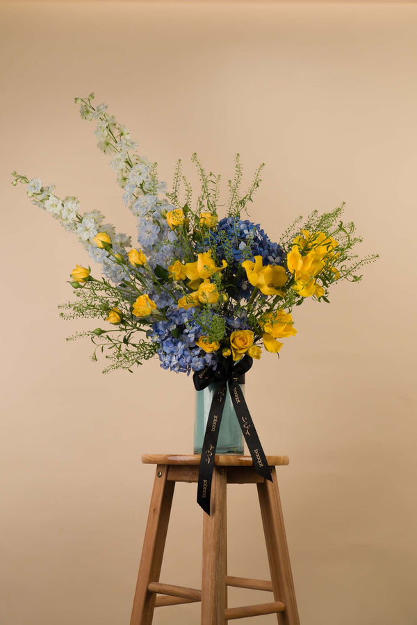 Sunshine & Sky – Yellow Roses with Blue Hydrangea Luxury Vase Arrangement