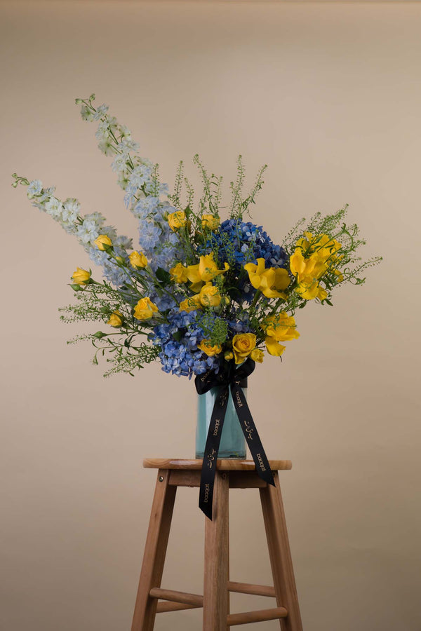 Sunshine & Sky – Yellow Roses with Blue Hydrangea Luxury Vase Arrangement